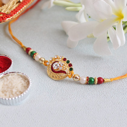 Gleaming Stone Studded Golden Rakhi